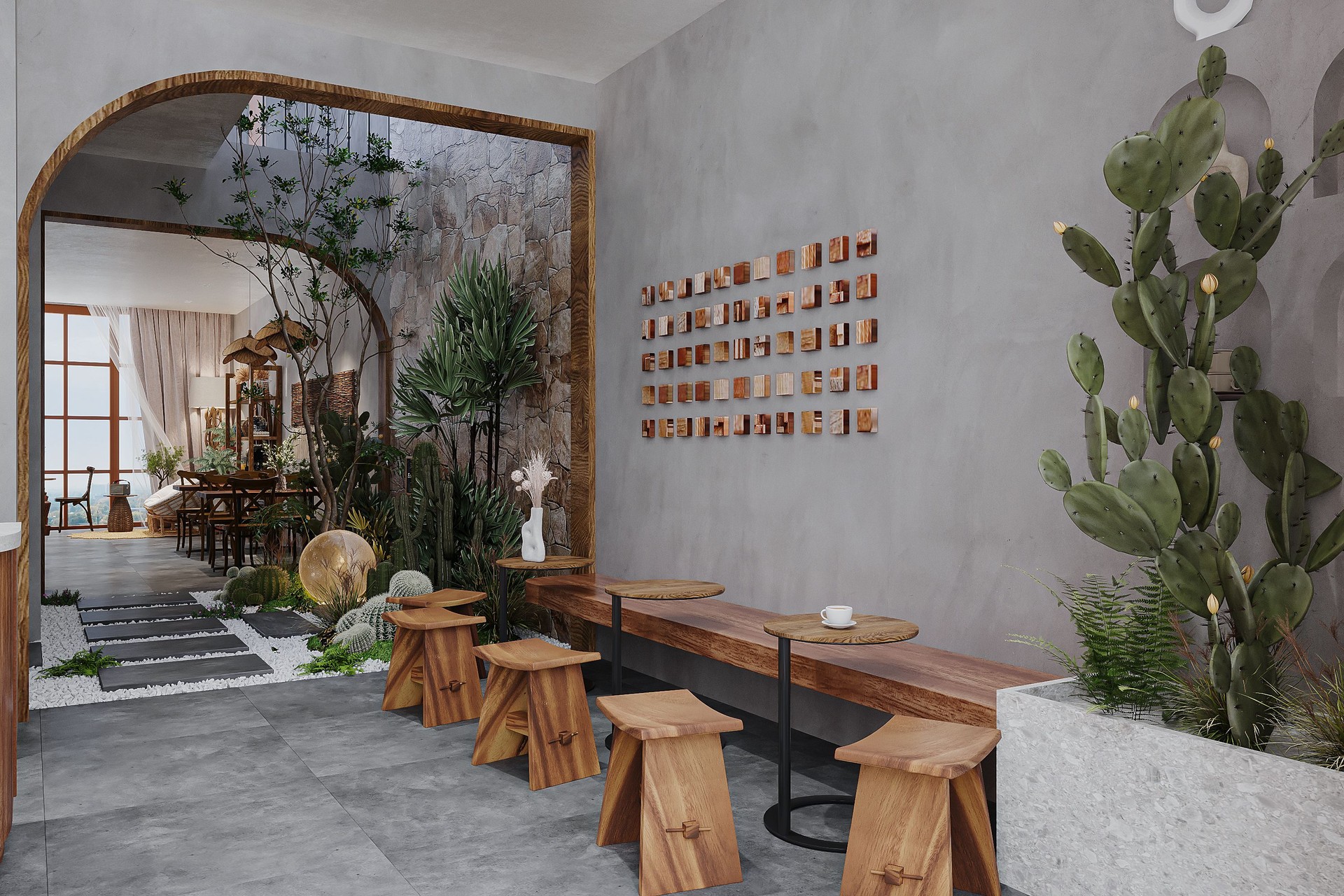 Interior of of a modern, minimalist cafe with a curved wooden ceiling light wood furniture, and a cactus corner.